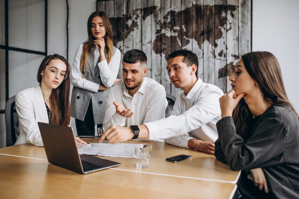 Business meeting around large table